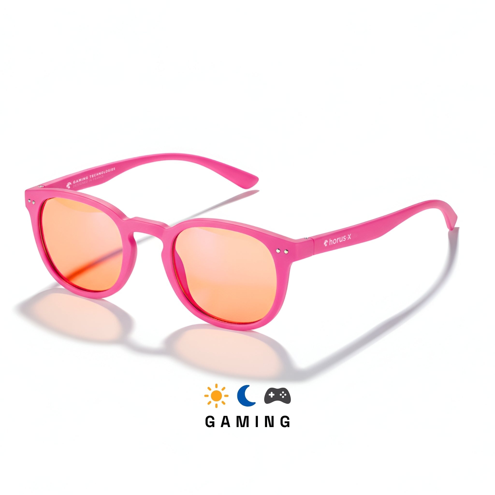 Lunettes gaming rondes roses avec verres ambrés sur fond blanc